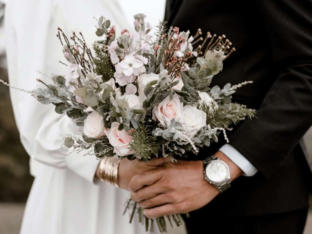 Bride and Groom holding hands